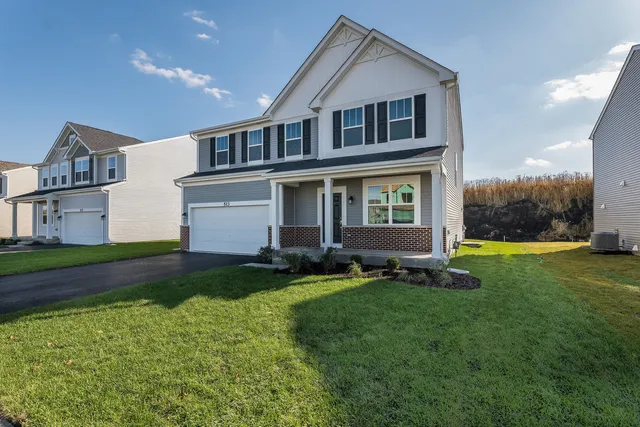 a big house with a big yard and more windows