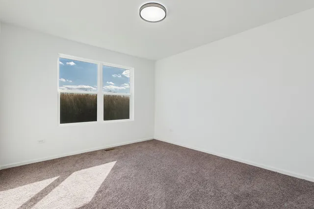 an empty room with window