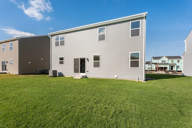 a view of a backyard of house
