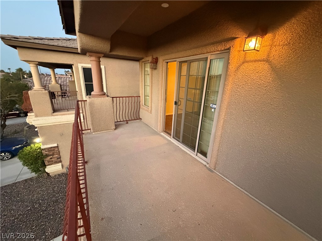 7629 Rory Court Las Vegas, NV 89129 - Photo 23 of 25 Step onto the balcony, offering serene views and inviting outdoor relaxation.