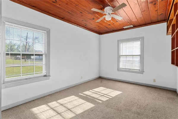 an empty room with windows