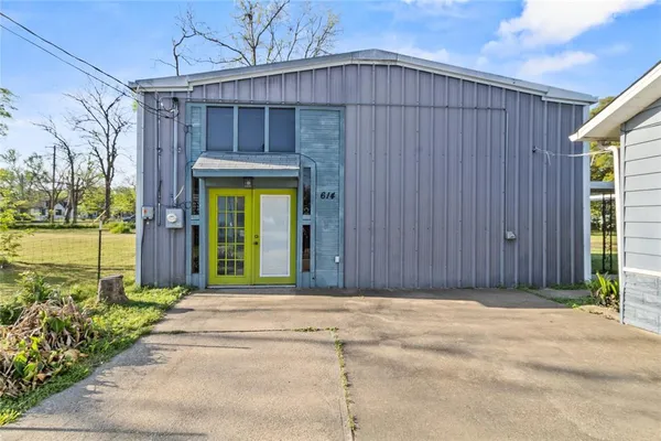 a front view of a house having yard