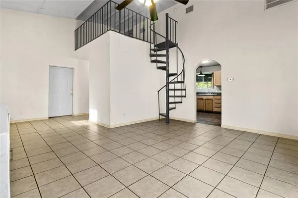 a view of a livingroom with wooden floor