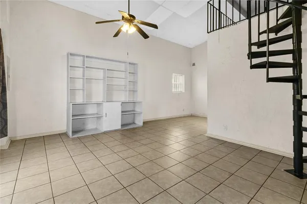 a view of a room with racks and white walls