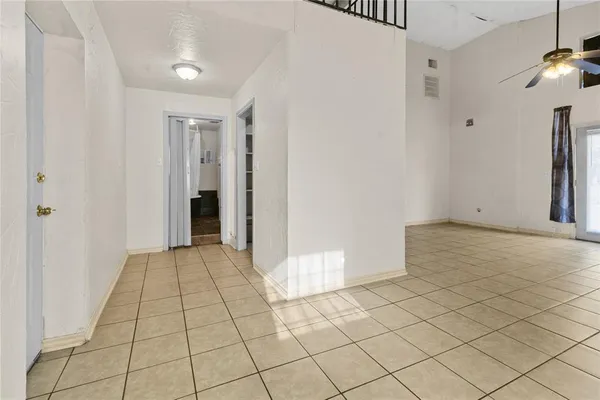 a view of an empty room and window