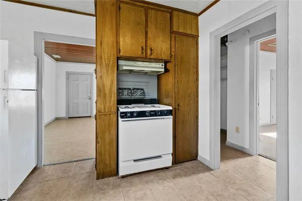 a view of kitchen and utility room