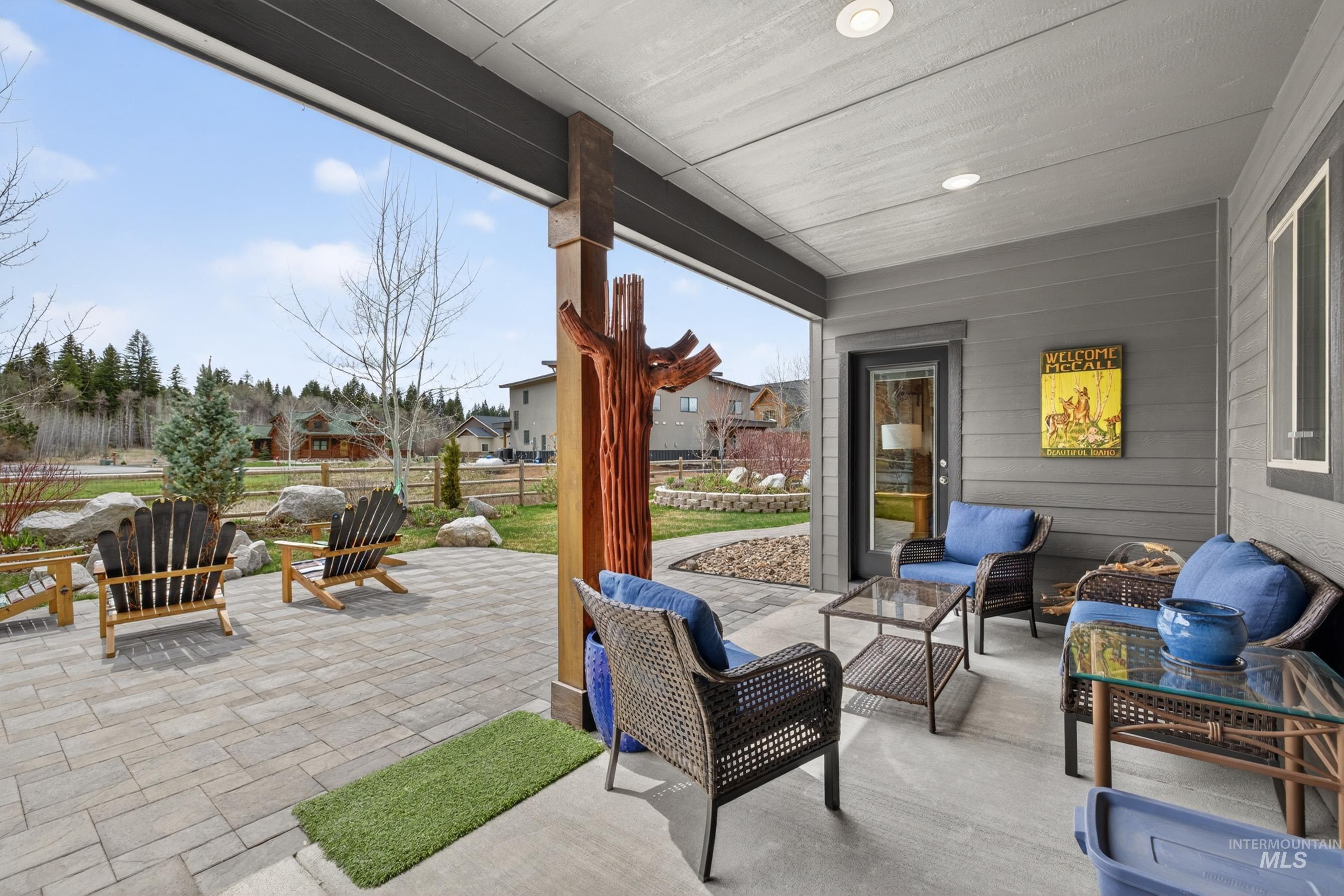 1126 Mo's Way McCall, ID 83638 - Photo 36 of 50 Covered outdoor patio featuring a concrete floor, recessed lighting, and direct access to an exterior paver patio