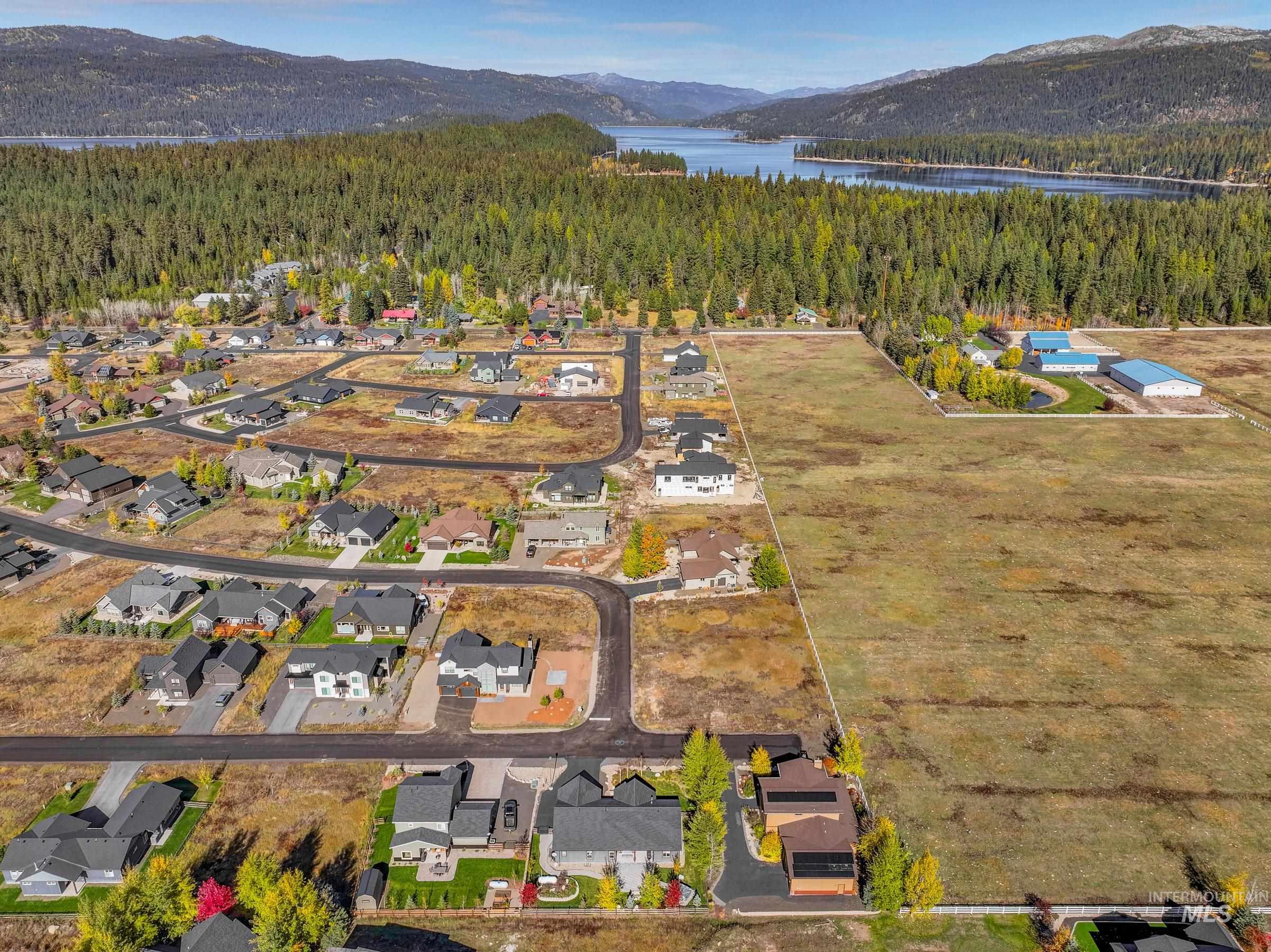 1126 Mo's Way McCall, ID 83638 - Photo 50 of 50 Aerial perspective of a developing residential area with paved streets and established homes