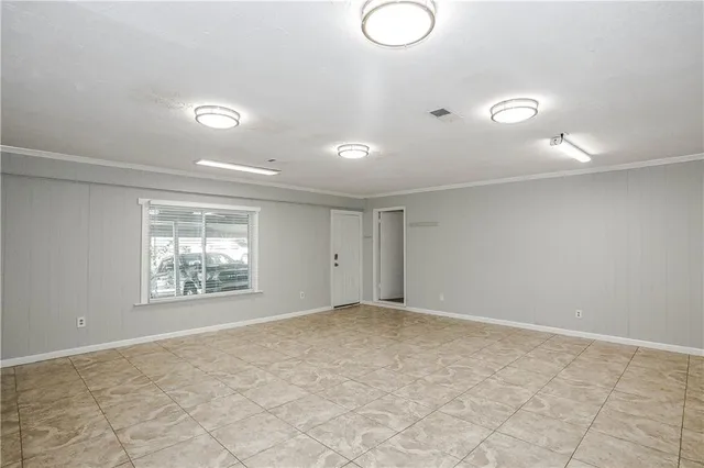 a view of a storage and utility room with washer and dryer
