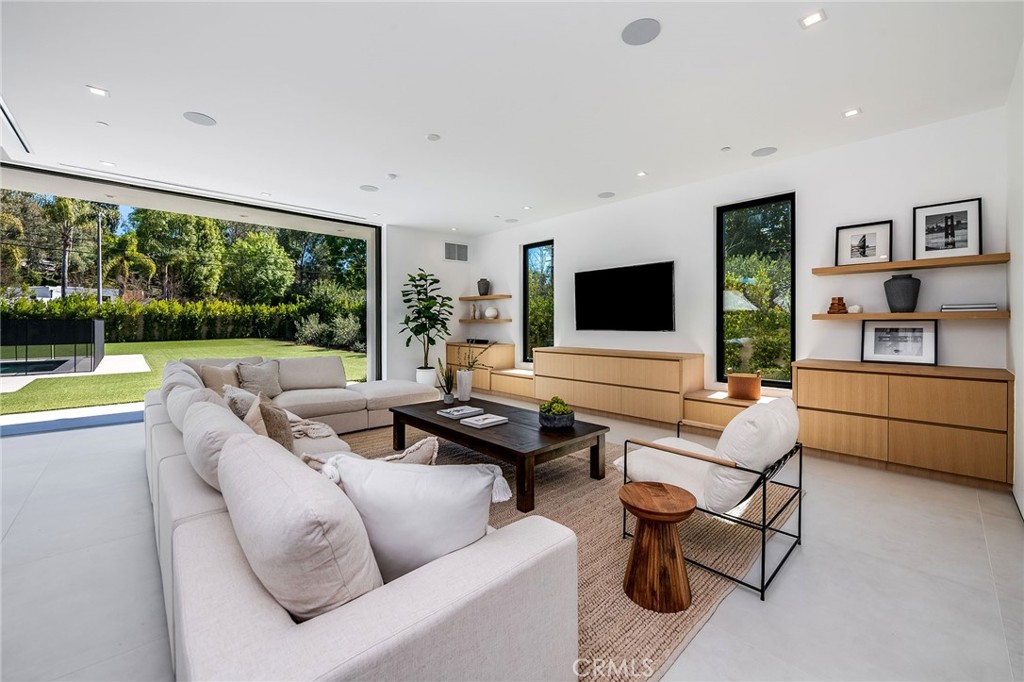 4930 Palomar Drive Tarzana, CA 91356 - Photo 1 of 43 a living room with furniture and large flat screen tv