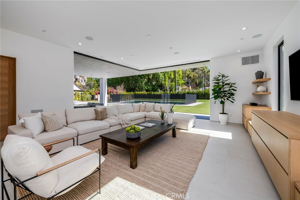 4930 Palomar Drive Tarzana, CA 91356 - Photo 16 of 43 a living room with furniture and a large window