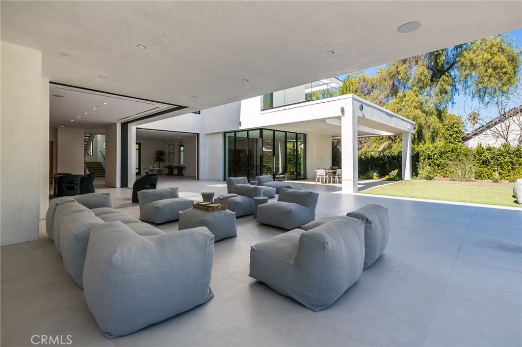 4930 Palomar Drive Tarzana, CA 91356 - Photo 19 of 43 a living room with furniture and a large window