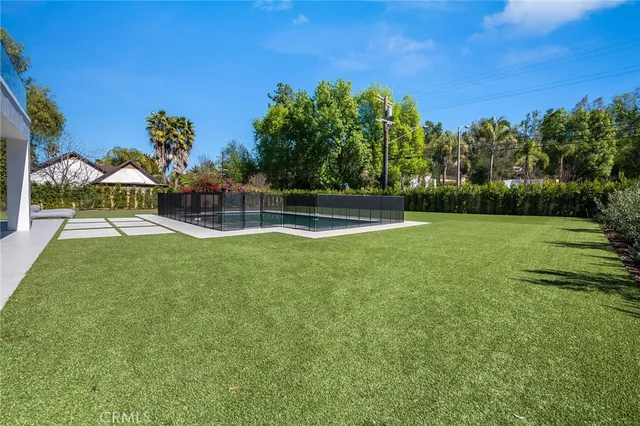 a view of a park with swings and slides
