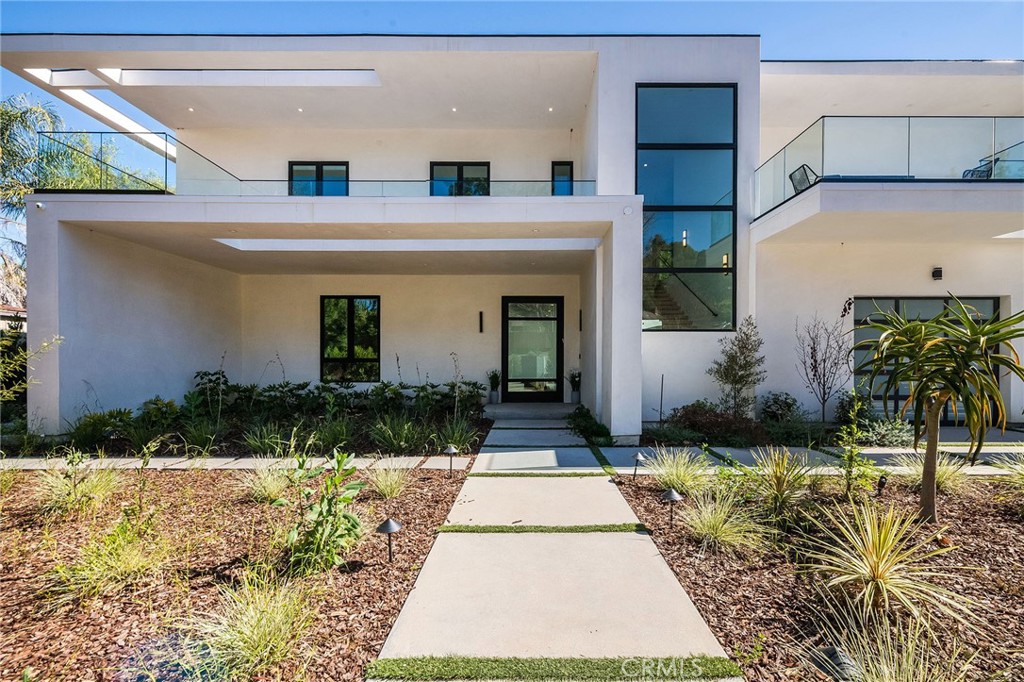 4930 Palomar Drive Tarzana, CA 91356 - Photo 4 of 43 a view of a house with a yard