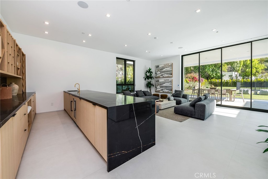 4930 Palomar Drive Tarzana, CA 91356 - Photo 9 of 43 a living room with furniture large window and flat screen tv