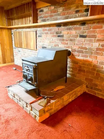 a bathroom with a shower and a sink