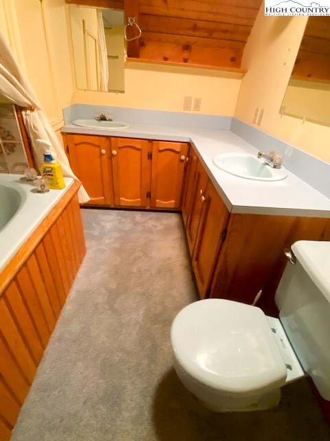 169 Woodside Road Galax, VA 24333 - Photo 31 of 49 a bathroom with a sink and a mirror