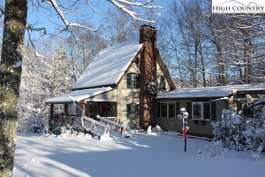 169 Woodside Road Galax, VA 24333 - Photo 34 of 49 a view of a house with a patio