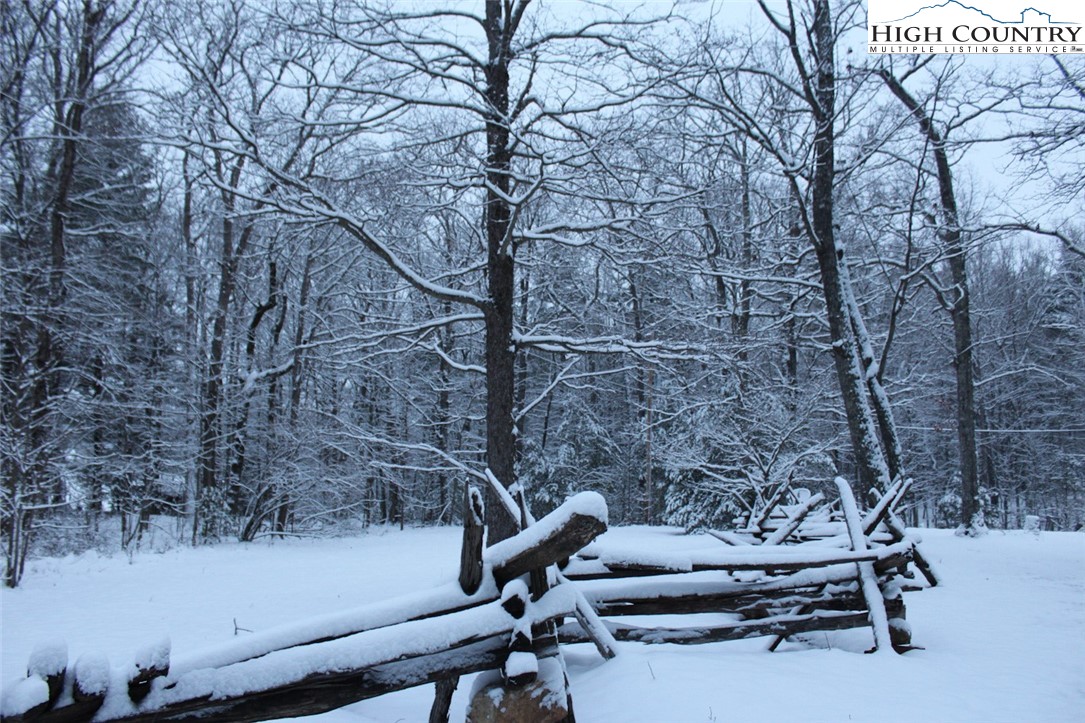169 Woodside Road Galax, VA 24333 - Photo 46 of 49 a view of sitting area with chairs and wooden fence