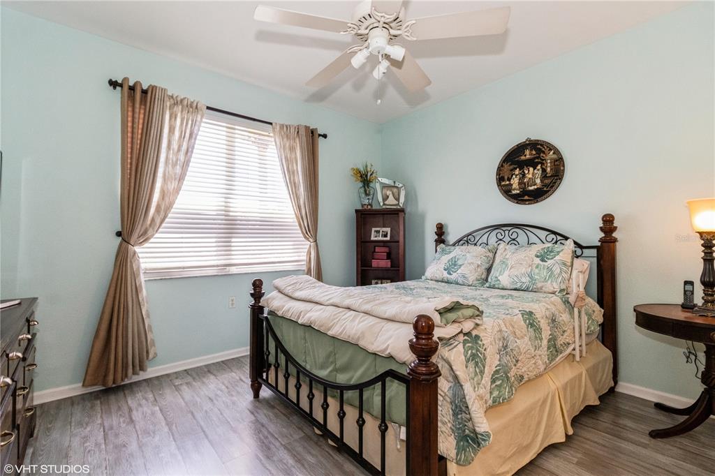 3010 Meandering Way, Unit 101 Fort Myers, FL 33905 - Photo 19 of 37 a bedroom with a bed and a window