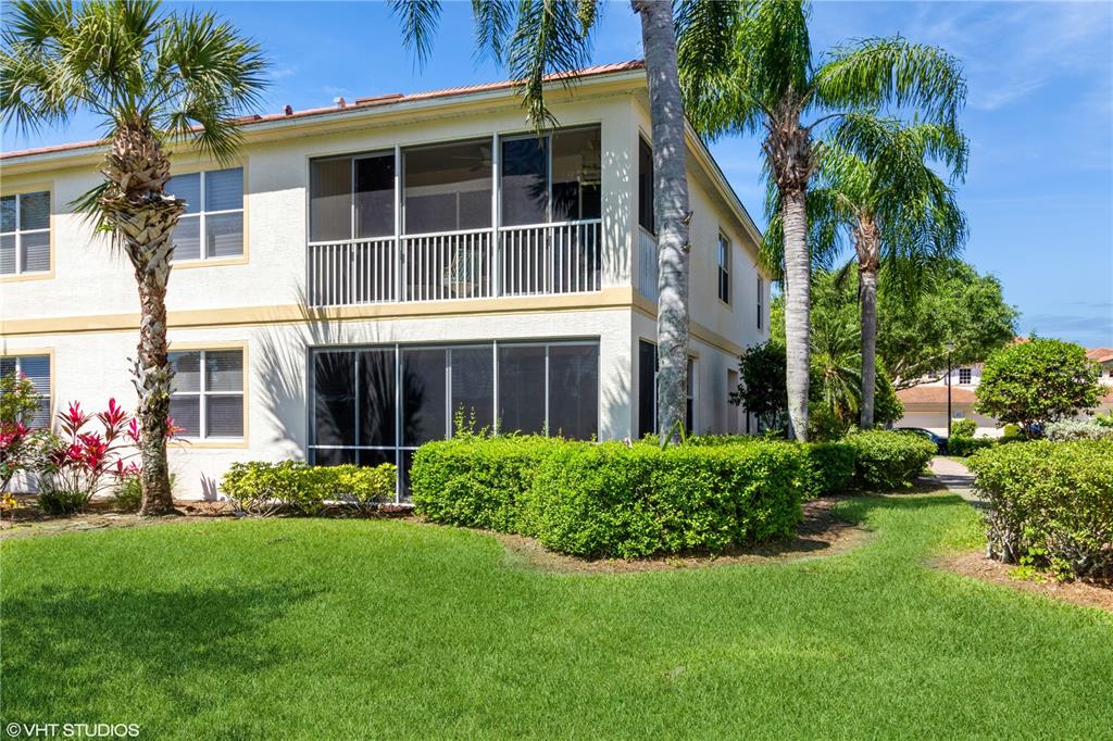 3010 Meandering Way, Unit 101 Fort Myers, FL 33905 - Photo 34 of 37 a house view with a garden space
