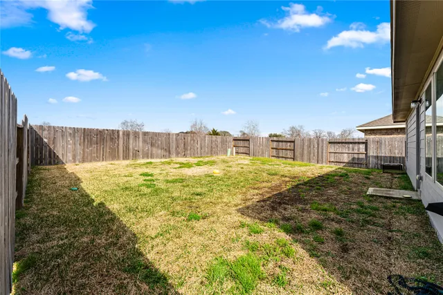 a swimming pool with a yard
