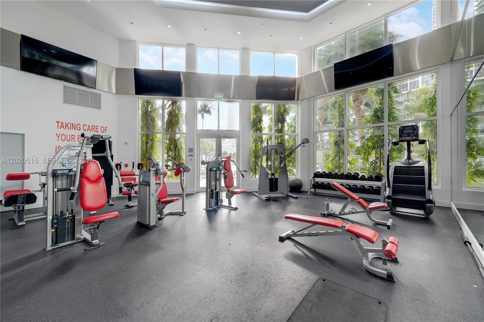 901 Brickell Key Boulevard, Unit 609 Miami, FL 33131 - Photo 18 of 27 2-story fitness center