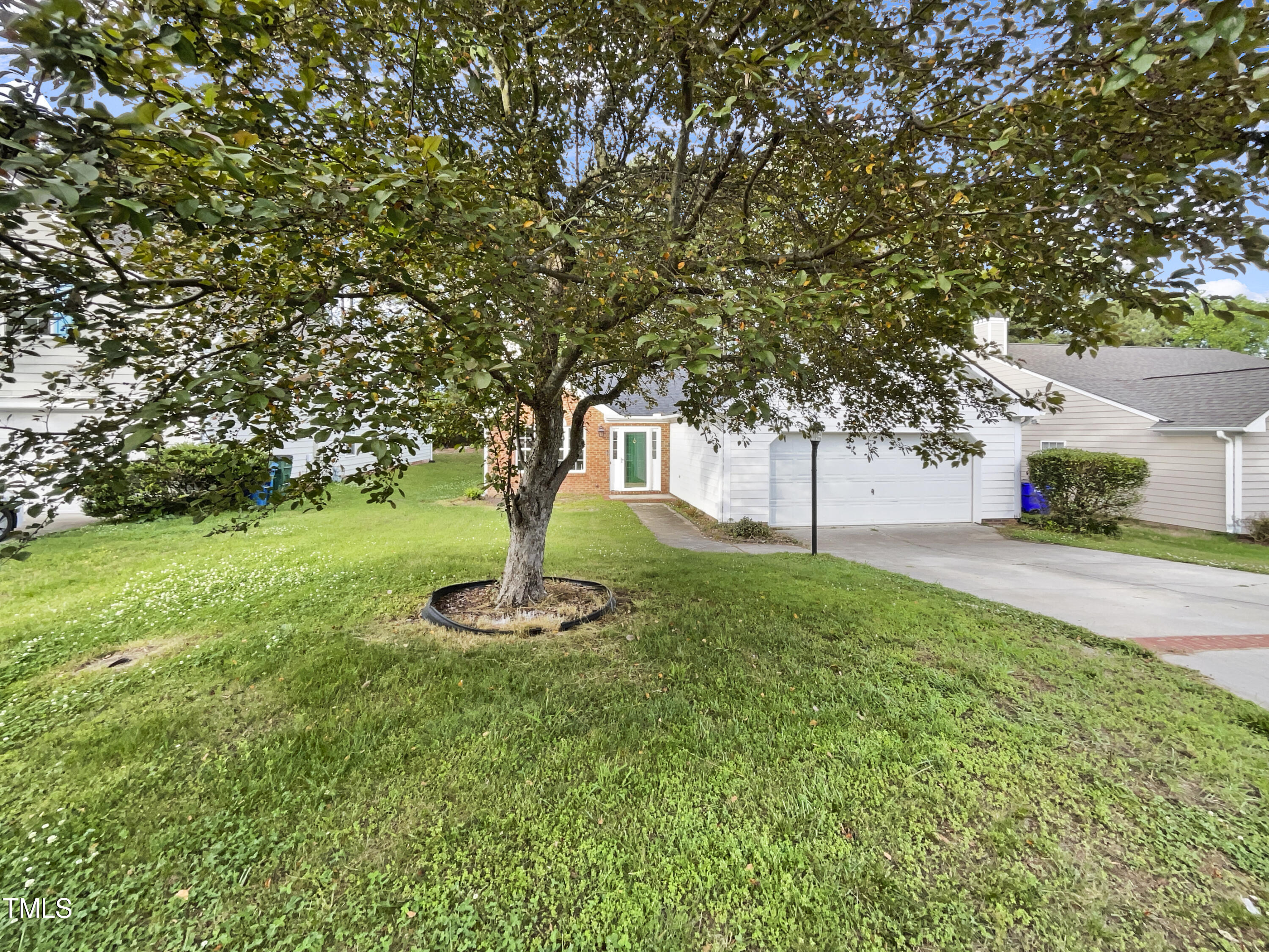 11 Windsor Glen Drive Durham, NC 27703 - Photo 1 of 29 a front view of a house with a yard