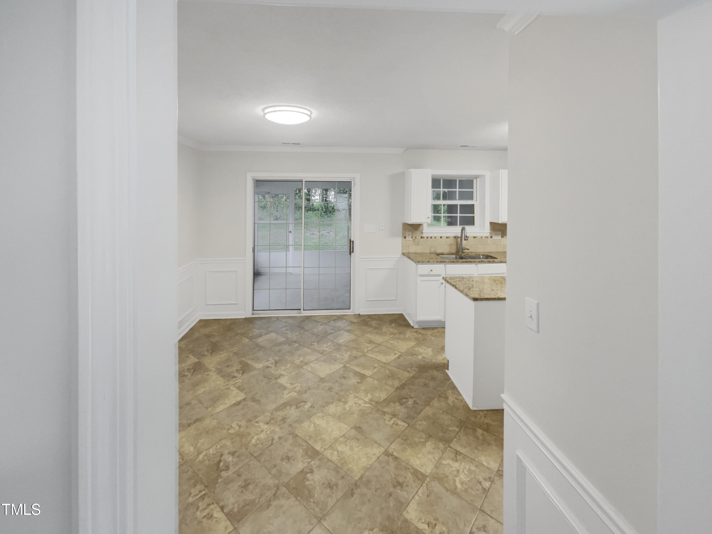 11 Windsor Glen Drive Durham, NC 27703 - Photo 13 of 29 a view of a kitchen with a sink and cabinets