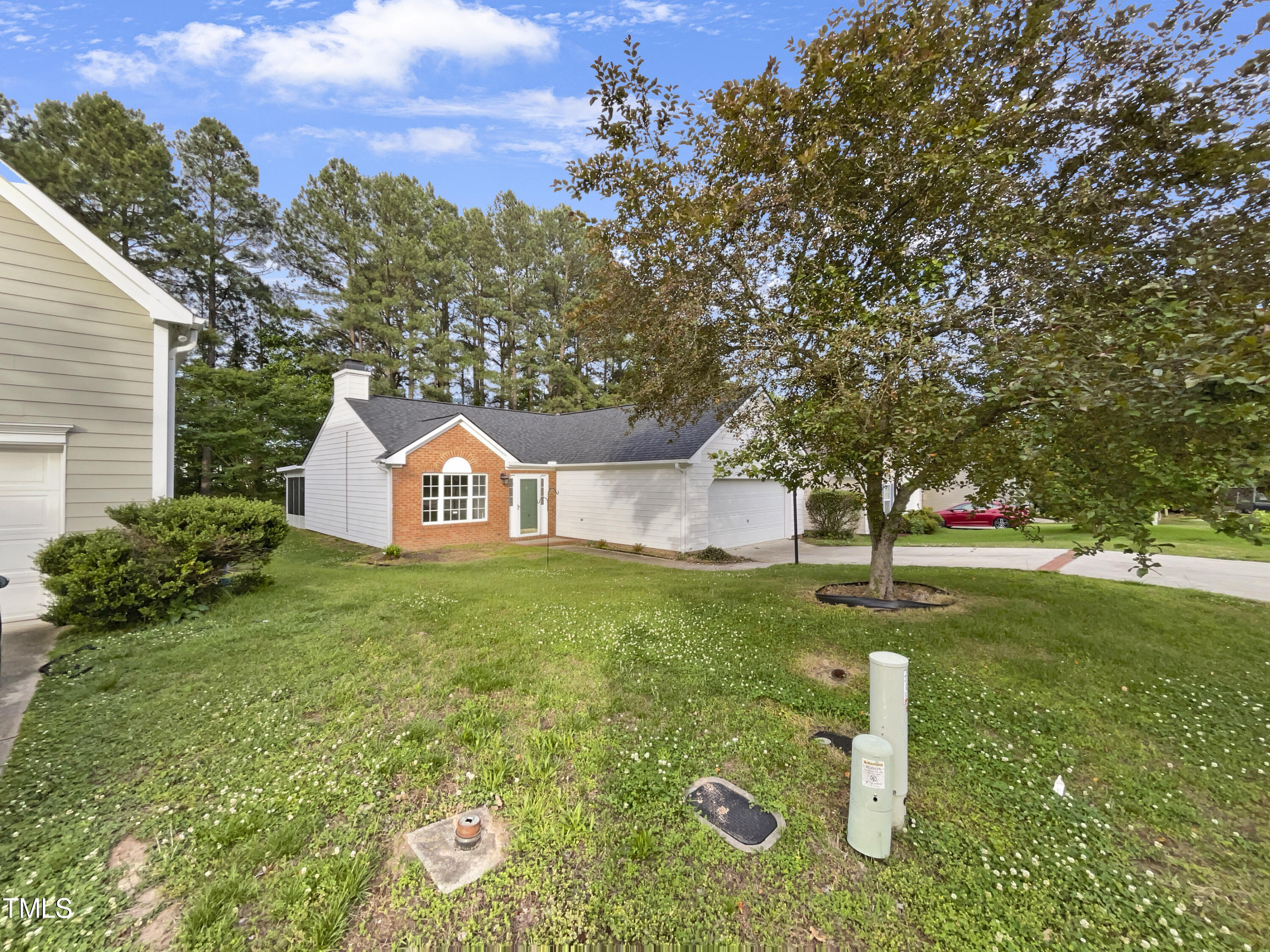 11 Windsor Glen Drive Durham, NC 27703 - Photo 9 of 29 a front view of a house with garden