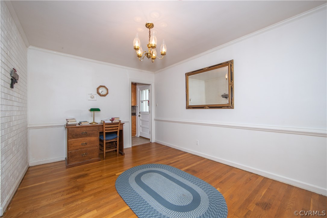 1319 Covington Road Colonial Heights, VA 23834 - Photo 17 of 44 a view of a livingroom with furniture and wooden floor