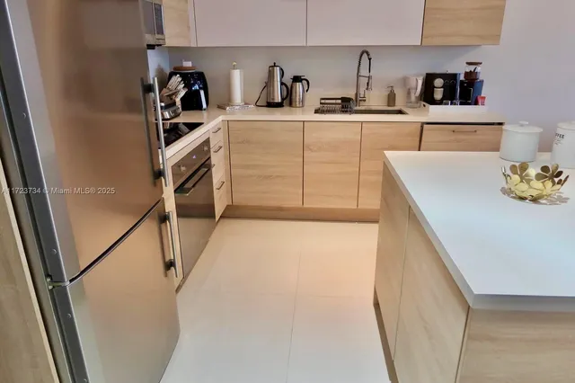 a bathroom with a sink tub shower and a mirror