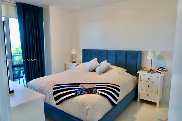 a view of swimming pool with a table and chairs