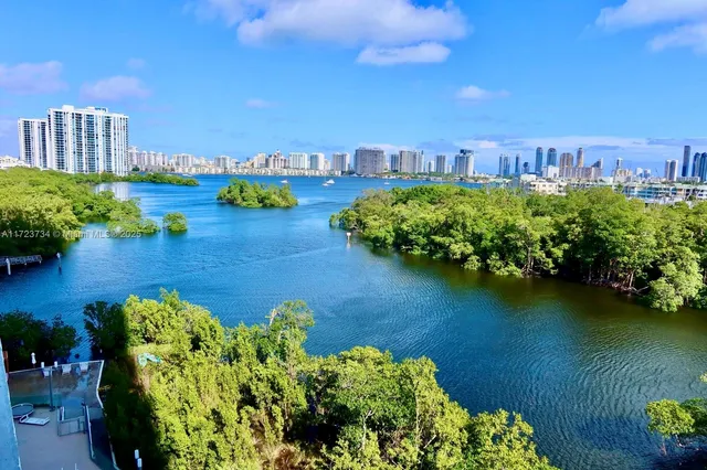 a view of balcony with chairs and a potted plant
