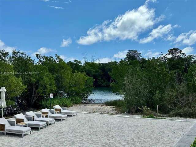 a room with gym equipment and a large window