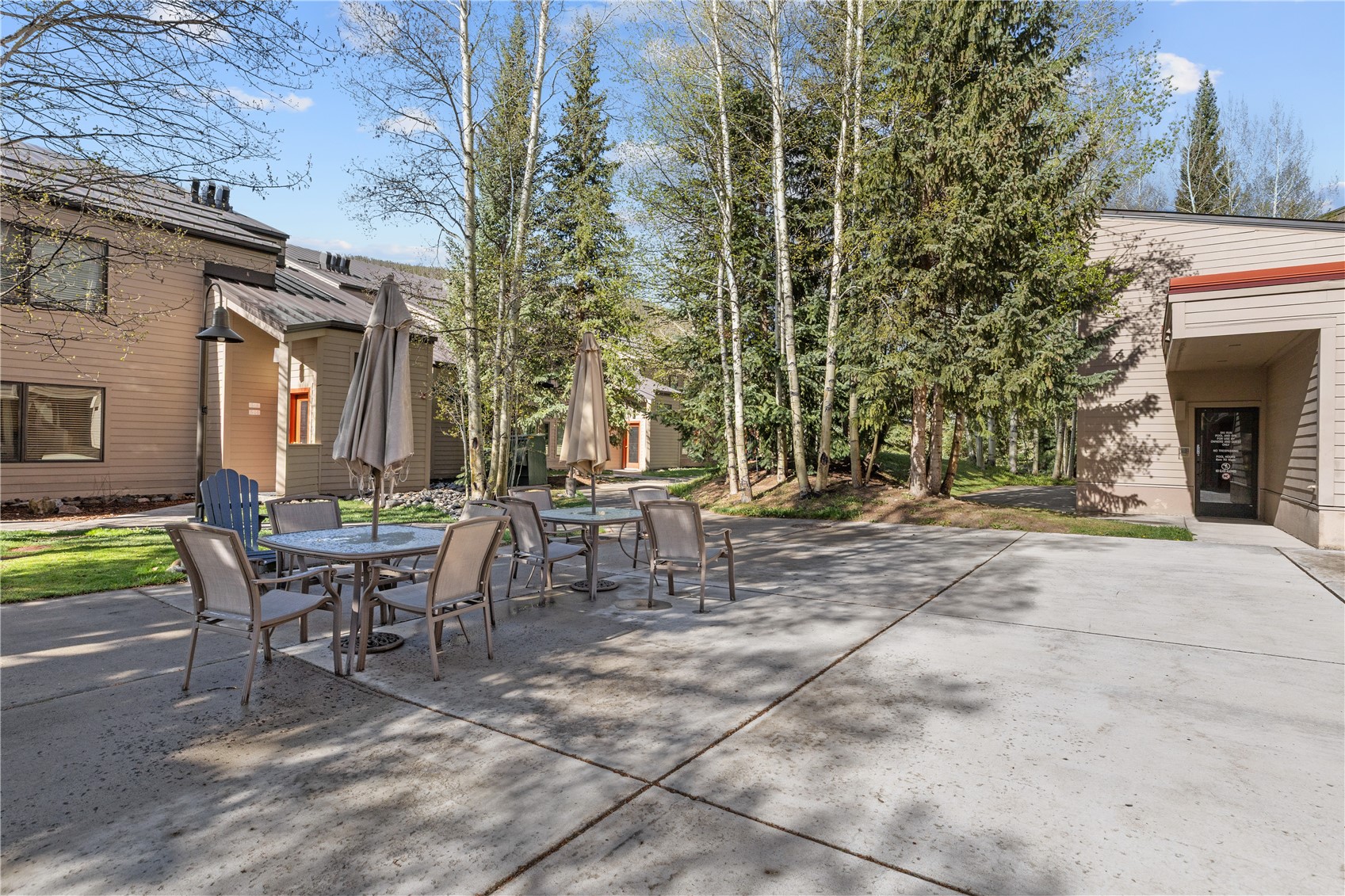 22804 Highway 6, Unit 102 Keystone, CO 80435 - Photo 27 of 34 a view of a patio with a table and chairs