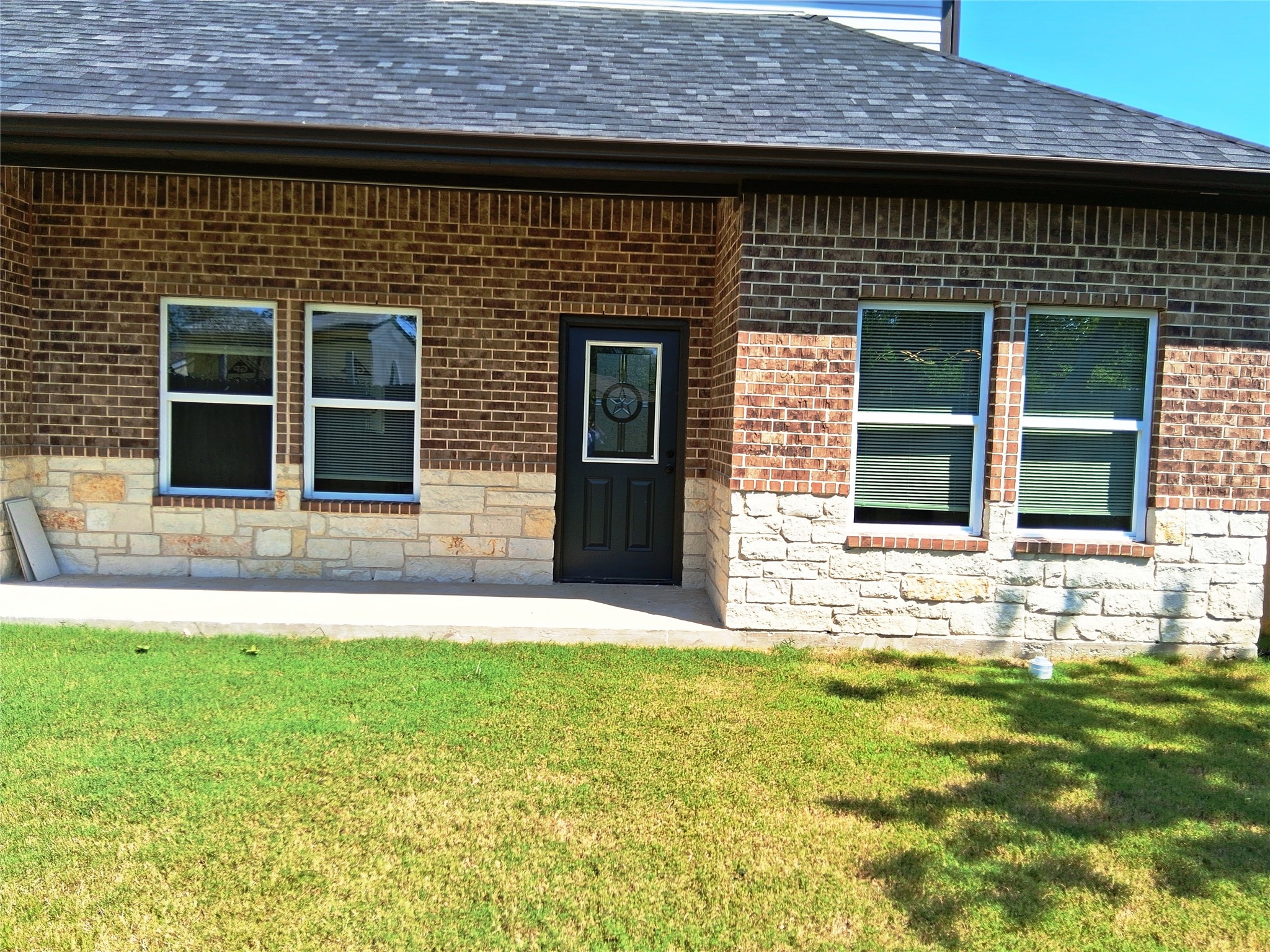 9001 Cheer Street Houston, TX 77063 - Photo 26 of 29 a view of a house with a yard
