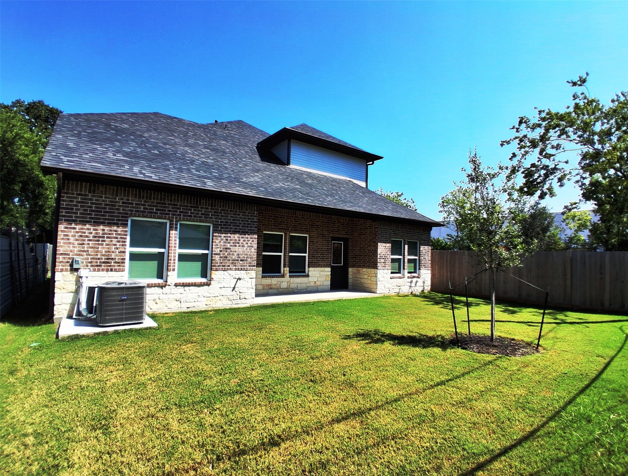 9001 Cheer Street Houston, TX 77063 - Photo 27 of 29 a view of a house with a yard and sitting area