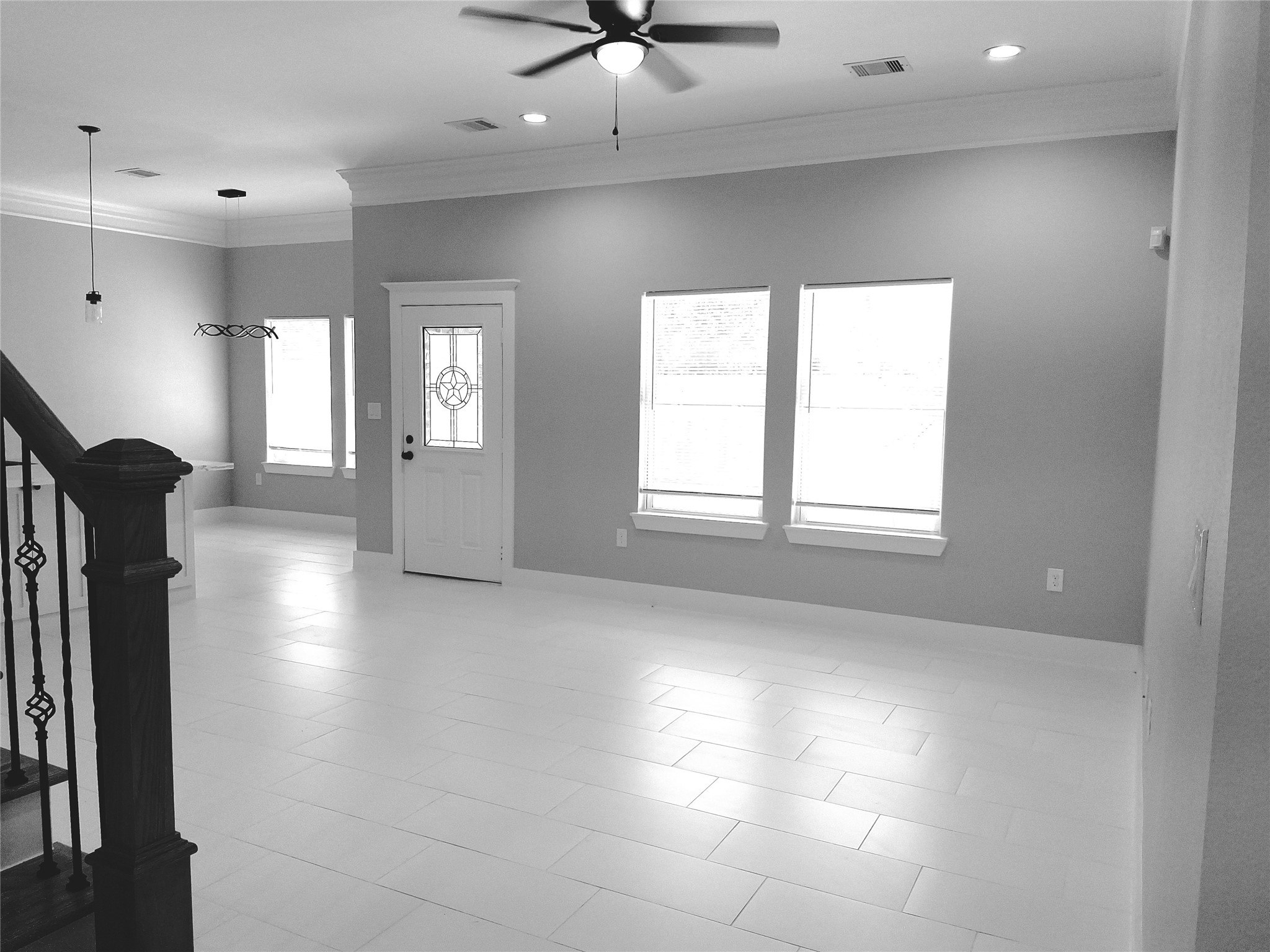 9001 Cheer Street Houston, TX 77063 - Photo 3 of 29 a view of an empty room with a window