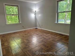 202 Crane Hollow Road Bethlehem, CT 06751 - Photo 14 of 36 a view of an empty room with a window