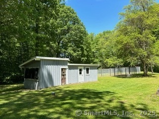 202 Crane Hollow Road Bethlehem, CT 06751 - Photo 21 of 36 a backyard of a house with lots of green space