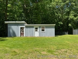 202 Crane Hollow Road Bethlehem, CT 06751 - Photo 23 of 36 a view of a house with a yard