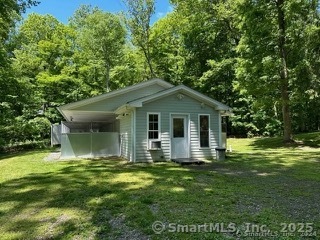 202 Crane Hollow Road Bethlehem, CT 06751 - Photo 36 of 36 a front view of house with yard and green space