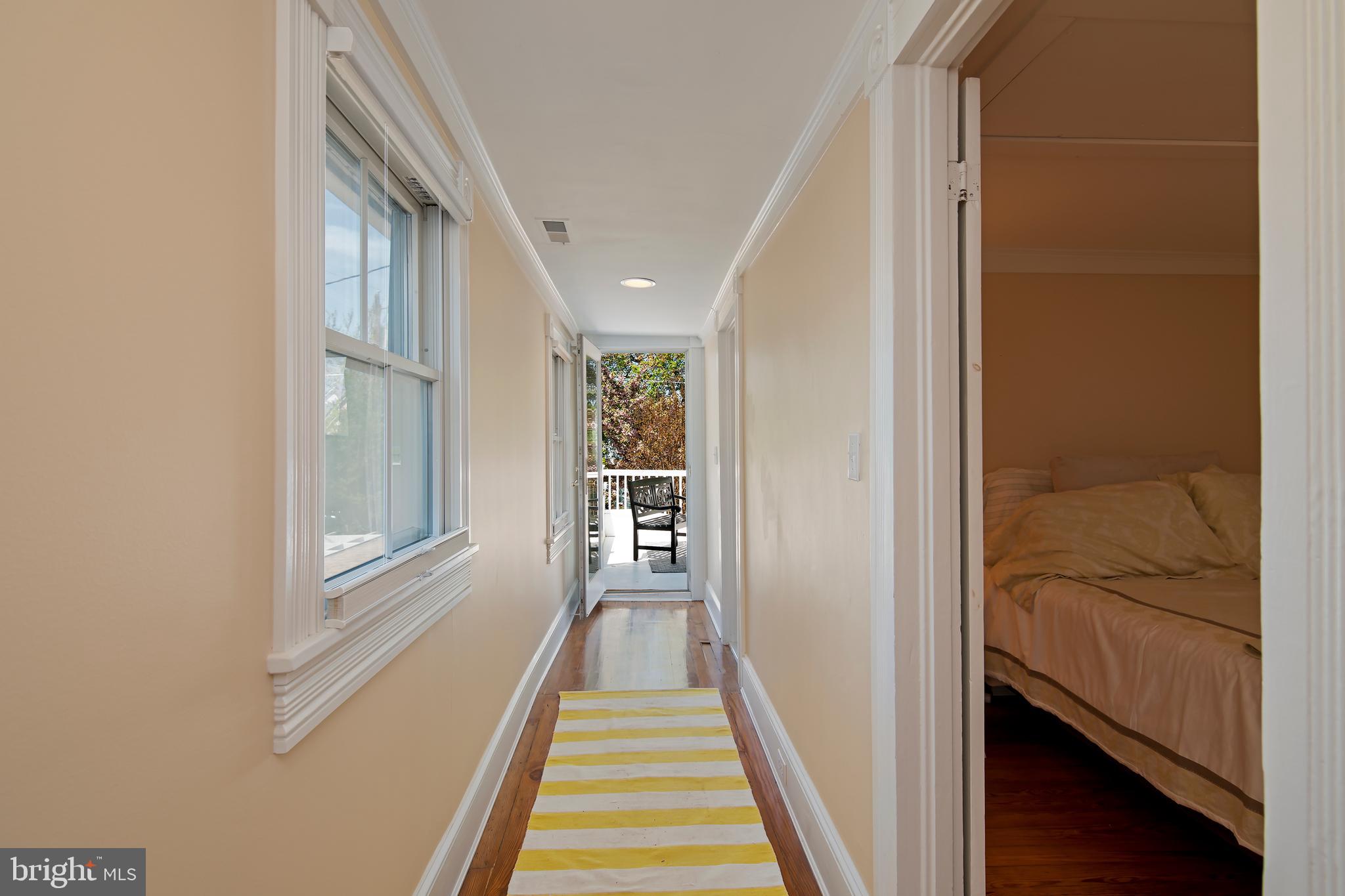 9 West End Avenue Cambridge, MD 21613 - Photo 37 of 62 Center Hall Leading to Balcony