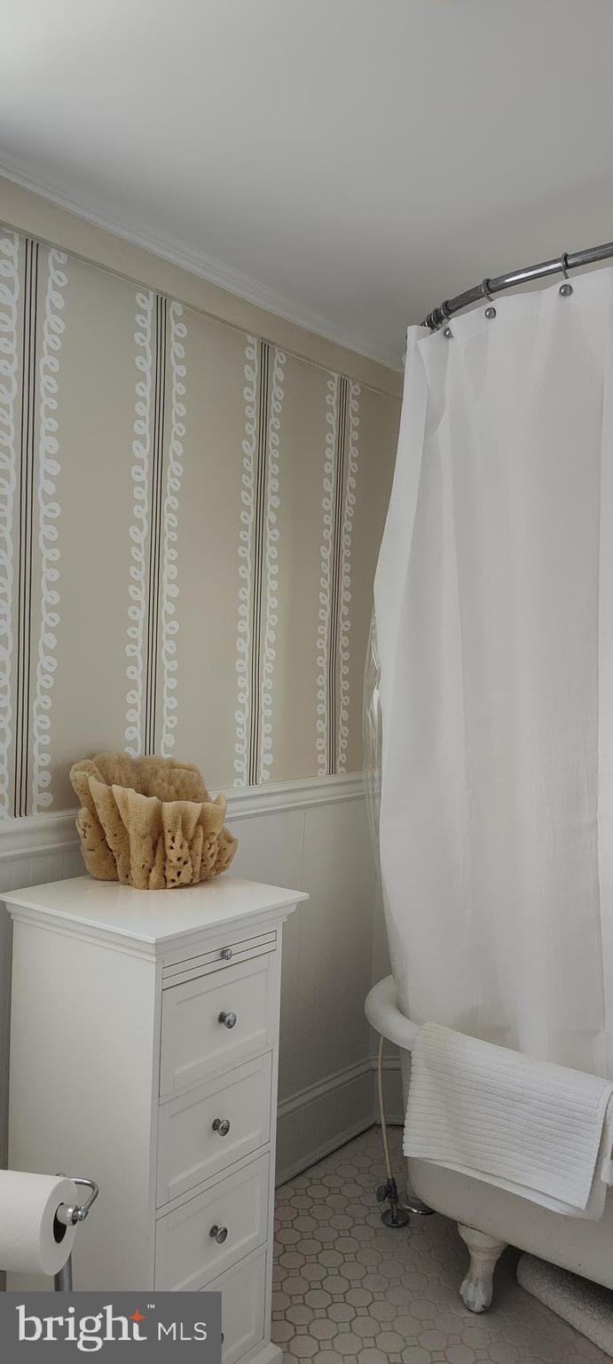 9 West End Avenue Cambridge, MD 21613 - Photo 41 of 62 Stylish wallpaper in upper-level bath.