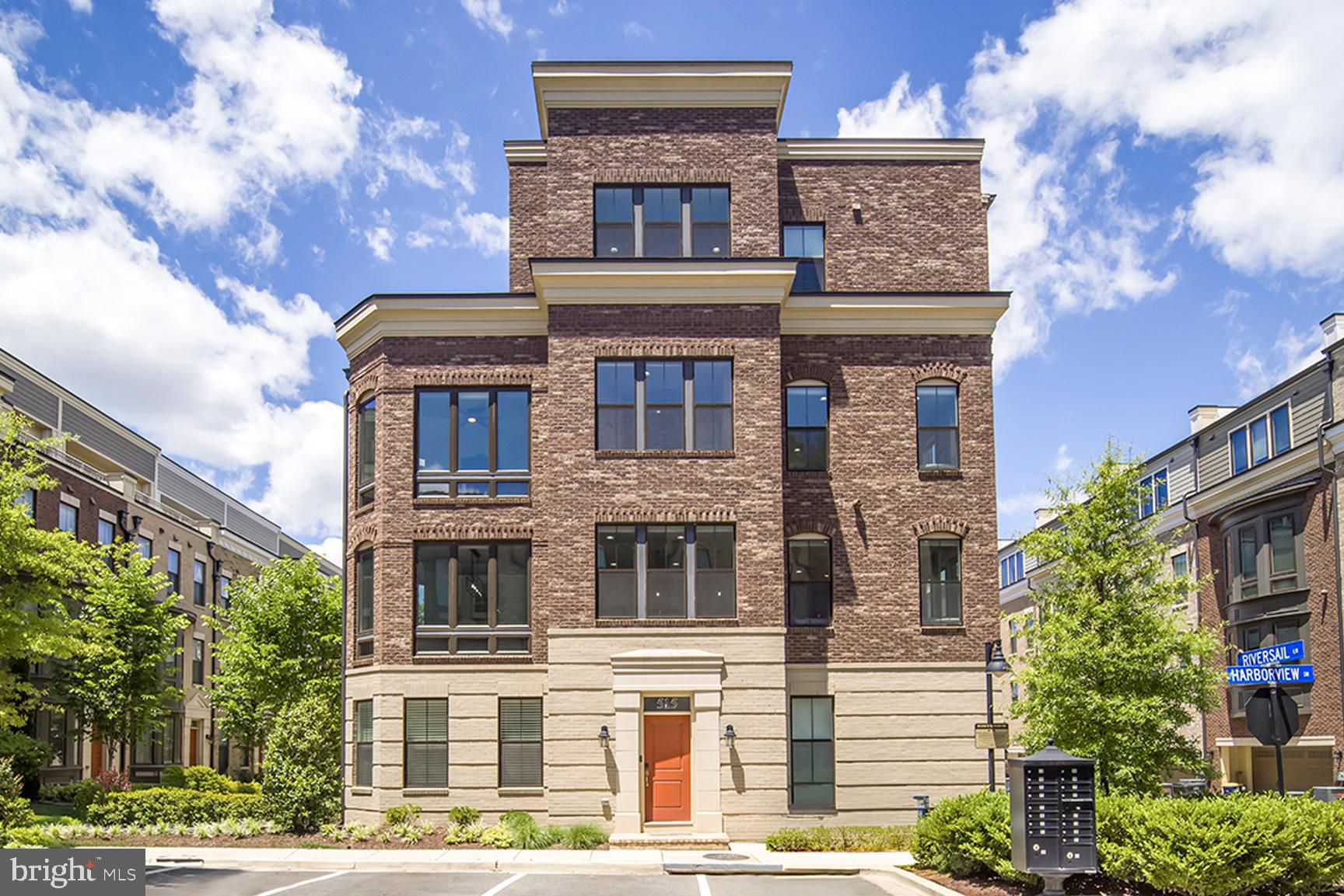 515 Riversail Lane, Unit 430 Oxon Hill, MD 20745 - Photo 1 of 54 a front view of a multi story building