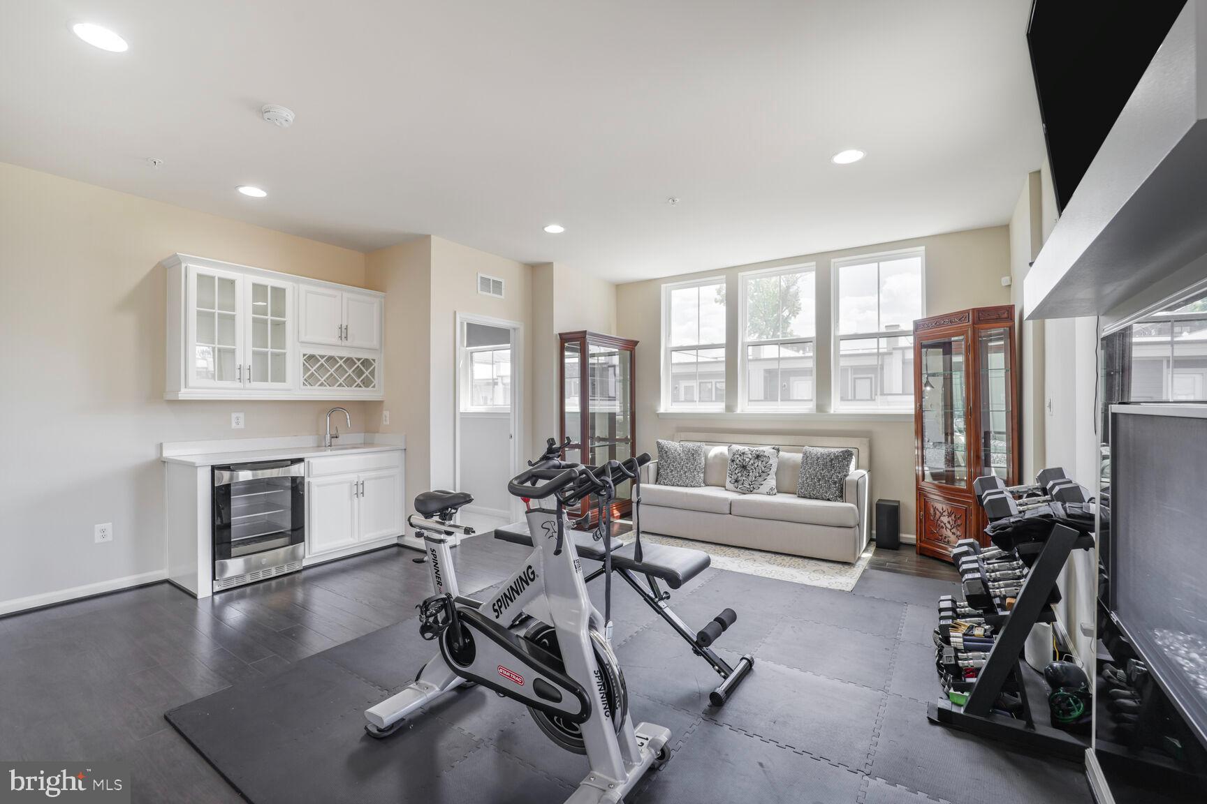 515 Riversail Lane, Unit 430 Oxon Hill, MD 20745 - Photo 38 of 54 a view of a livingroom with furniture and a fireplace