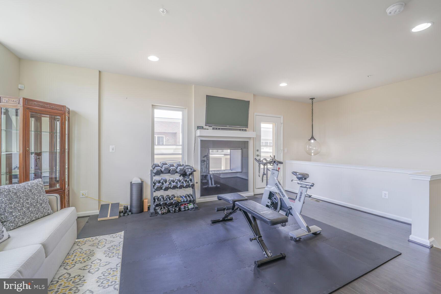 515 Riversail Lane, Unit 430 Oxon Hill, MD 20745 - Photo 40 of 54 a living room with furniture and window