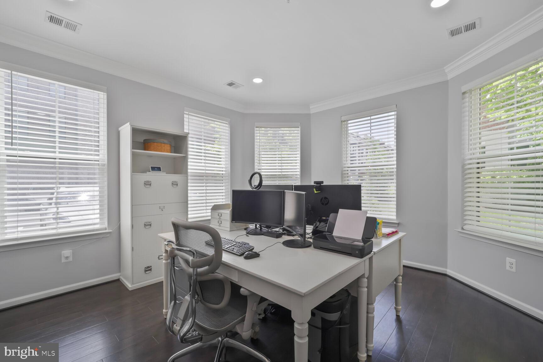 515 Riversail Lane, Unit 430 Oxon Hill, MD 20745 - Photo 44 of 54 a view of a workspace with furniture and a window