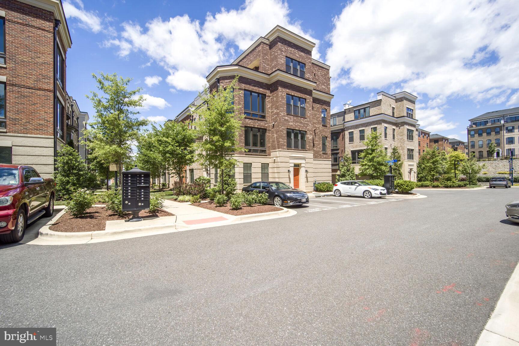 515 Riversail Lane, Unit 430 Oxon Hill, MD 20745 - Photo 50 of 54 a view of a street with a building in the background
